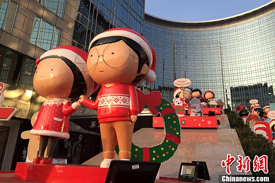 资料图 北京街头 中新社记者 廖攀 摄