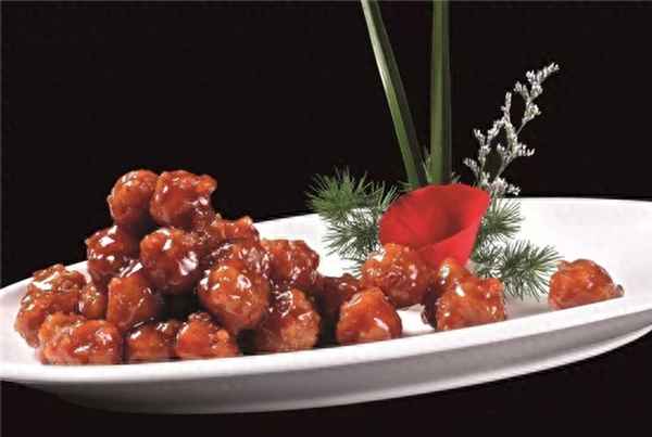 糖醋丸子里的肉應(yīng)該怎么處理,糖醋丸子是肉的還是素餡
