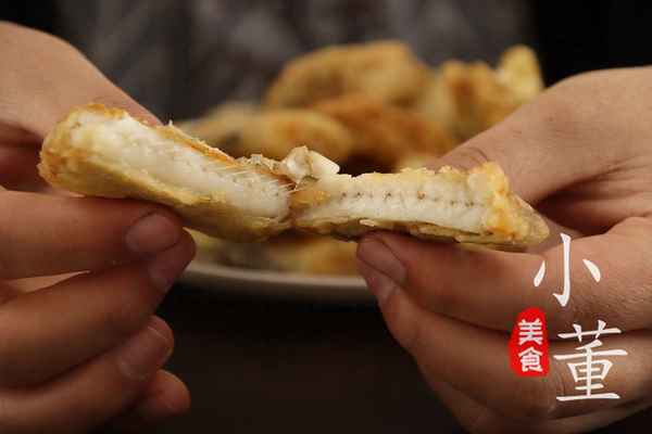 炸帶魚(yú)的家常做法步驟;油炸帶魚(yú)是裹面粉還是裹淀粉